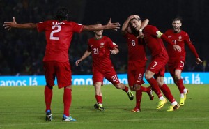 711-cristiano-ronaldo-celebrating-goal-with-his-portuguese-teammates